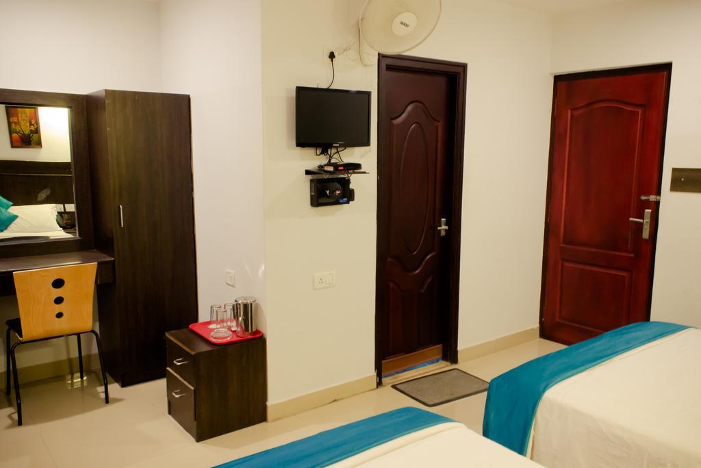 The Signature Inn Bangalore Rum bild